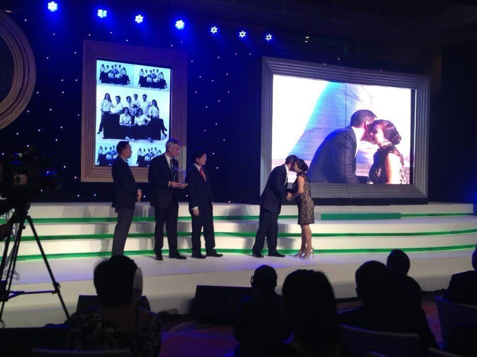 Receiving professional recognition on stage